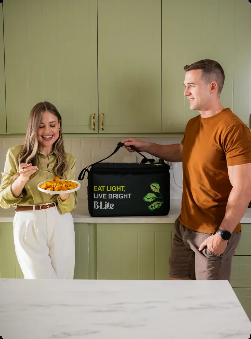 A couple enjoying fresh BLite meals delivered to their door